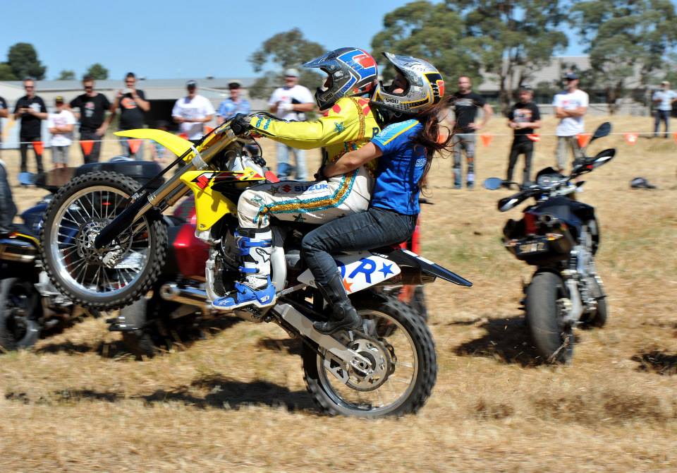 David Russell wheelie with a passenger.